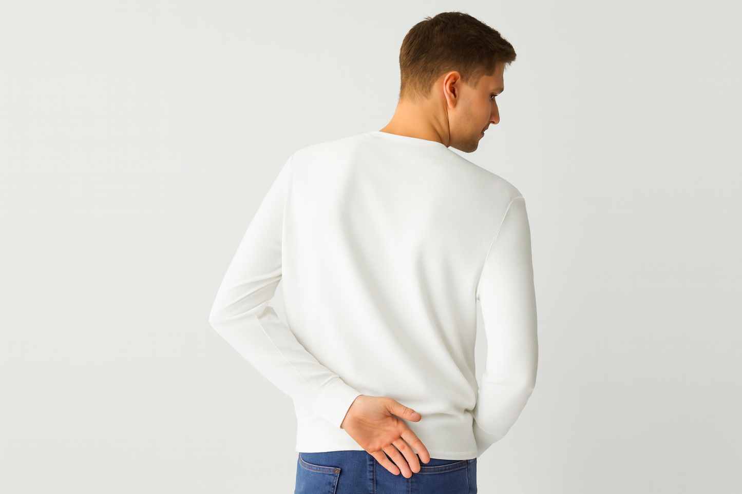 Caucasian model back view in white crewneck sweater